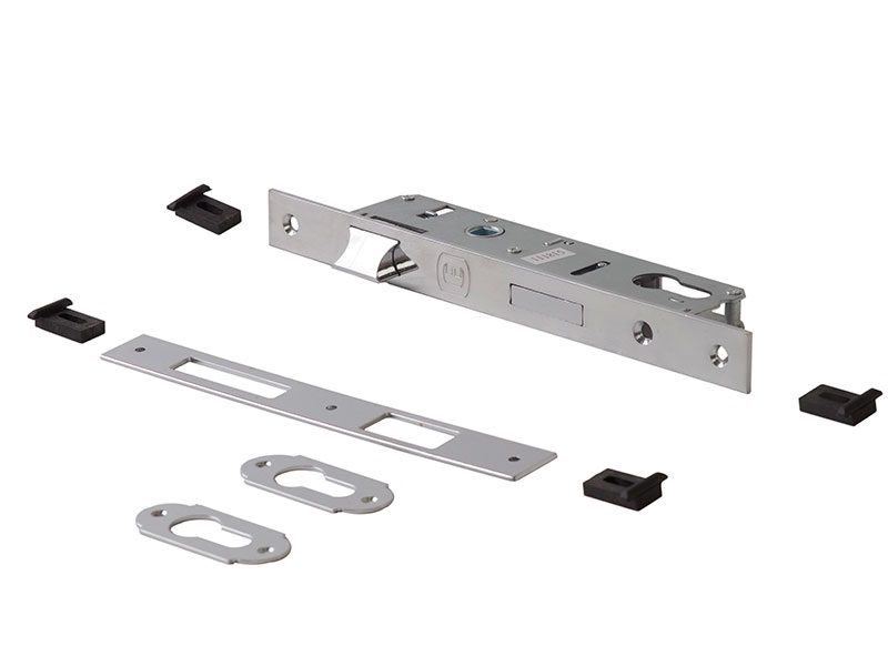 Комплект: замок ELEMENTIS однозапорный ригель с защелкой, ответная планка, 2 накладки на профильный цилиндр, 4 подкладки, саморезы, 1153/F23/30/85/8. Рис. 1 Комплект: замок ELEMENTIS однозапорный ригель с защелкой, ответная планка, 2 накладки на профильный цилиндр, 4 подкладки, саморезы, 1153/F23/30/85/8. Рис. 1